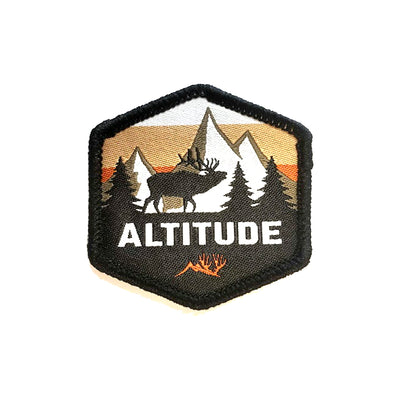 A Hexagonal shaped patch for hats and features a bull elk in the rut with Altitude in bold caps below the bull. 